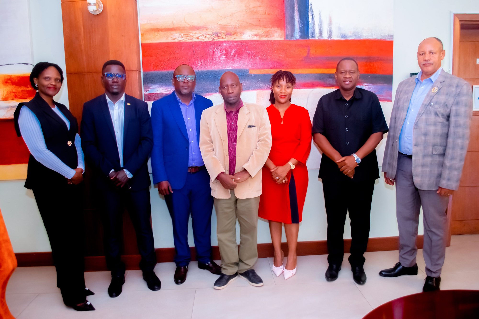 The BSI Finance management team and Board of Directors together after a board meeting